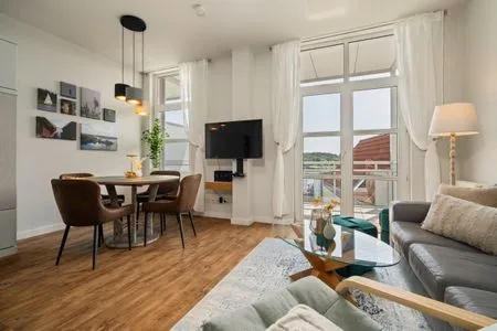 Ferienwohnung Hafenkino Müritz Wohnzimmer mit TV  Hafenkino