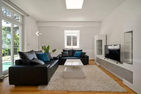 Apartment Strandglück Malchow – Modernes Wohnzimmer mit elegantem Design  Strandglück