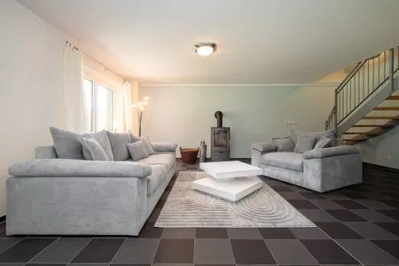 Einfamilienhaus Träumerei Alt Schwerin Wohnzimmer mit großzügiger Couch  Träumerei