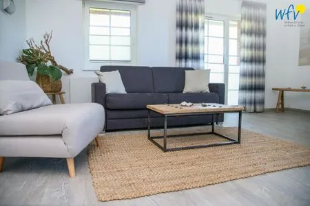 Wohnzimmer Ferienhaus am Gutspark Dranske Ferienwohnung Sonnentag