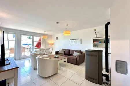 Einladendes Wohnzimmer für entspannte Stunden mit Familie und Freunden. Strandpark Lübecker Bucht Findus