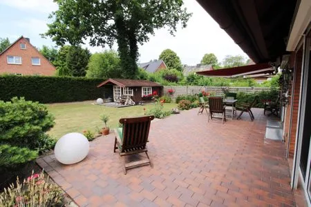 Terrasse Küstenglück – Urlaub mit Garten, Kamin & Komfort