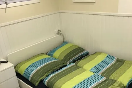 Schlafzimmer Dreibogen Ferienwohnung Lolle
