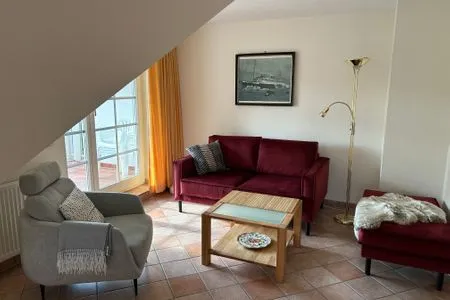 Wohnbereich mit Sofa und Sessel  Störtebekerstraße 9 - Wohnung 5
