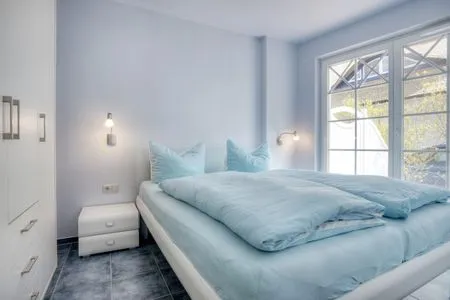 Schlafzimmer mit Doppelbett  de Obendtied - Wohnung 2