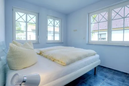 Schlafzimmer mit Doppelbett  de Obendtied - Wohnung 3