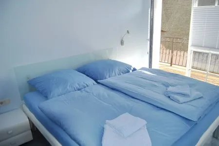 Schlafzimmer mit Doppelbett  de Obendtied - Wohnung 4