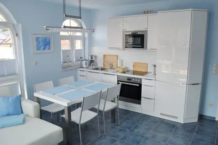 Essbereich mit Küchenzeile  de Obendtied - Wohnung 4