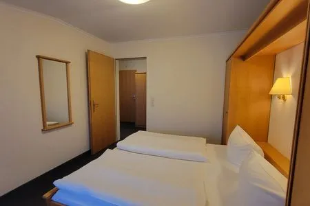 Schlafzimmer Wohnung 22 im Haus Hühnergott