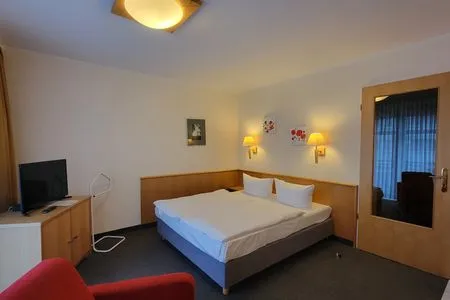 Schlafzimmer Wohnung 8 im Haus Hühnergott