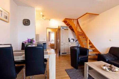 Wohnzimmer (DKK11) Ferienwohnung Strandburg