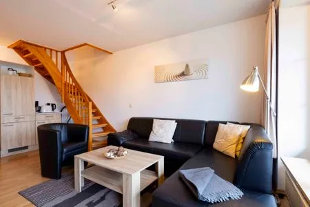 Wohnzimmer (DKK11) Ferienwohnung Strandburg