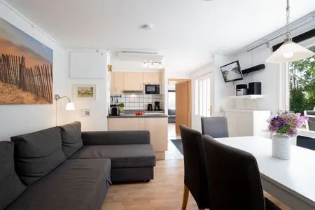 Wohnzimmer (ERL12) Ferienhaus Thorn