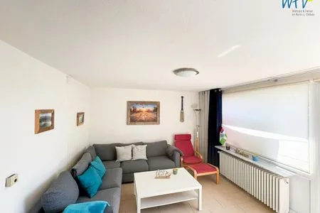 Wohnzimmer Süderhaus Ferienwohnung 9