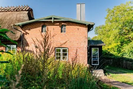 Ferienwohnung Hanna im Nebengebäude Ferienwohnung Hanna im Reethus Mühlenlund