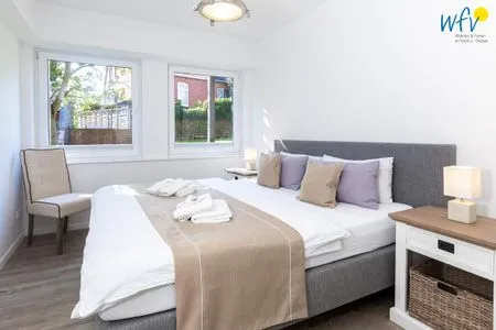 Schlafzimmer Appartementhaus Villa am Januspark Ferienwohnung Border Suite