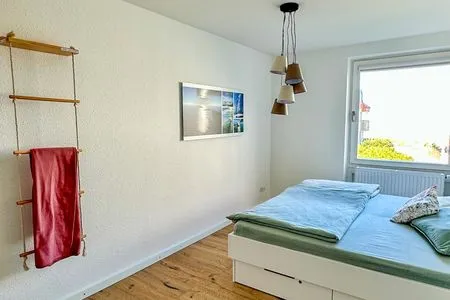 Schlafzimmer Haus Südwind Ferienwohnung Wellenblick