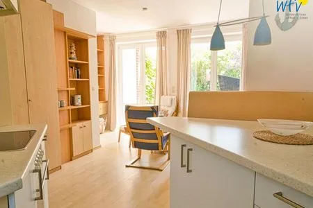 Wohnzimmer Ferienhäuser Jadehörn Ferienwohnung Sandfloh