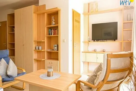 Wohnzimmer Ferienhäuser Jadehörn Ferienwohnung Sandfloh
