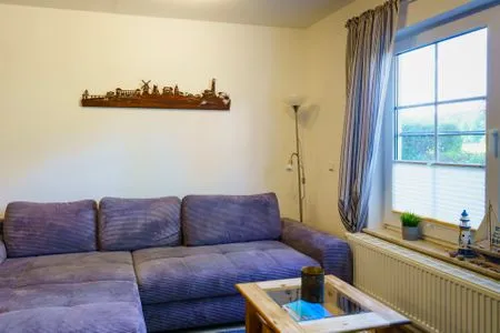 Wohnbereich mit Sofa  Am Deich Haus 36