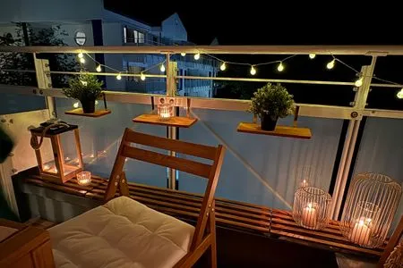 2 Ferienwohnung Aparthotel Zingst Heymat - Balkon am Abend  Heymat