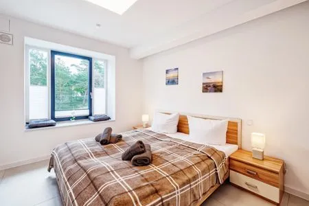 Schlafzimmer: Doppelbett (180x200) FeWo Abendrot in PRORA - 6.11