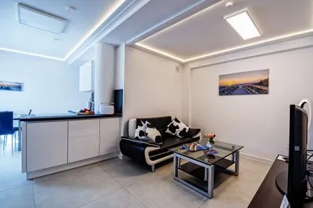 Wohnzimmer FeWo Abendrot in PRORA - 6.11