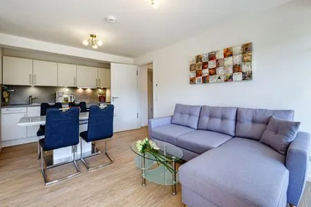 Wohn/Essbereich: Schlafsofa 160x200, TV, Zugang zum Balkon FeWo Arkonas Strandperle in PRORA - 5.23