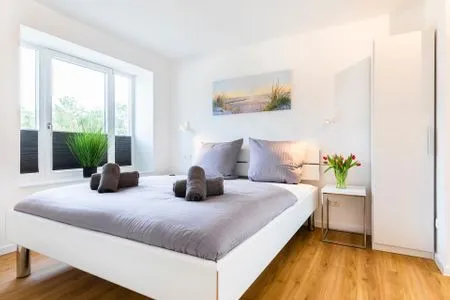 2 Schlafzimmer: 2 x Doppelbett (180 x 200cm) FeWo Dünenheide 2.2 in PRORA - 7.22