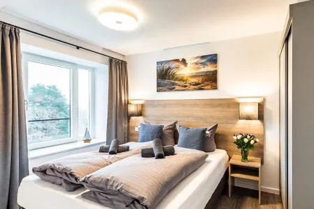 Schlafzimmer 1: Doppelbett (160x200), TV FeWo Meerzeit in PRORA - 2.42