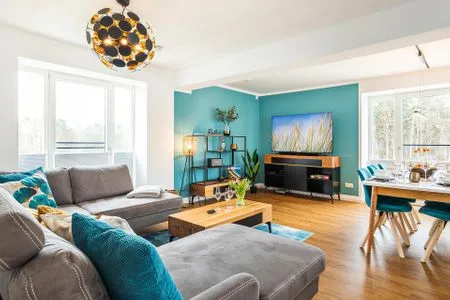 Wohnzimmer: Schlafsofa, TV FeWo Baltic Sunset in PRORA - 3.34