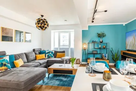 Wohnzimmer: Schlafsofa, TV FeWo Baltic Sunset in PRORA - 3.34