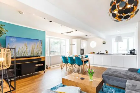 Wohnzimmer: Schlafsofa, TV FeWo Baltic Sunset in PRORA - 3.34