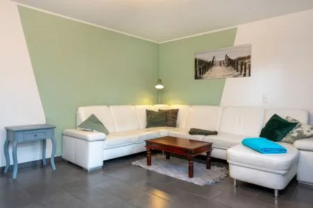 Wohnbereich mit Sofa  Haus Zeitlos