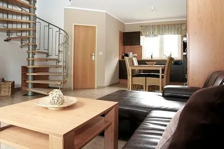 Wohnzimmer mit Blick zur Küche  Am Deich Haus 24