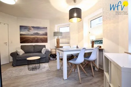 Wohnzimmer Haus Solaris Ferienwohnung D'runner un D'rover