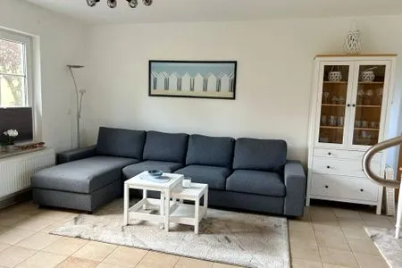 Wohnbereich mit Sofa Am Deich Am Deich Haus 18