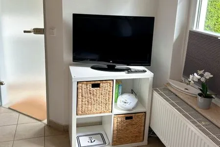 TV im Wohnzimmer  Am Deich Haus 18