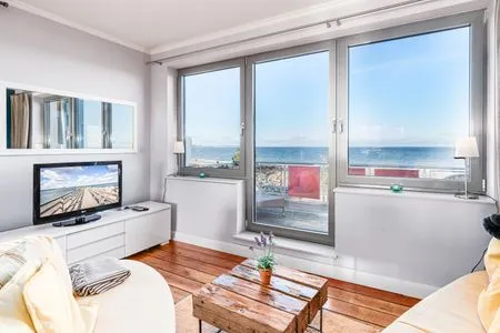 Wohnzimmer Strandvilla Beletage - exklusive Wohnung mit einzigartigem Meer - und Hafenblick