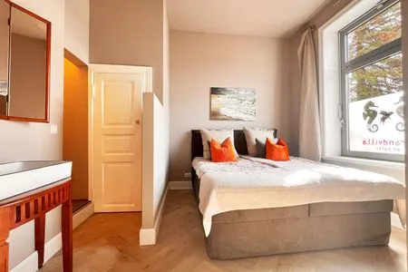 Schlafzimmer Strandvilla Hafenloge - stilvoll wohnen direkt am Niendorfer Hafen