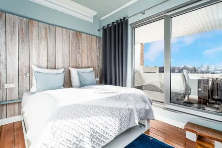 Schlafzimmer Strandvilla Beletage - exklusive Wohnung mit einzigartigem Meer - und Hafenblick