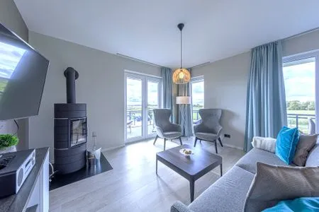 Ferienwohnung Strandnixe Ostseebad Wustrow ZweiWasser Alte Seefahrtschule Gemütlicher Wohnbereich  Strandnixe