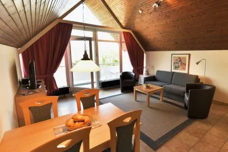 Wohnzimmer mit Balkon Appartement