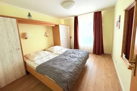 Schlafzimmer Wohnung 12 im Haus Hühnergott