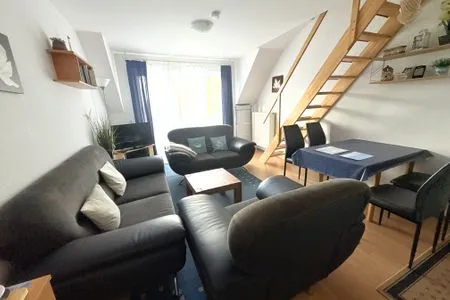 Wohnzimmer Ferienwohnung Sonnenperle - Wohnung 13