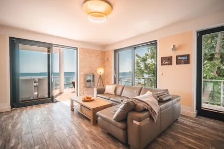 Wohnzimmer Villa Friede-Marie, App. Ostseeweitblick - mit traumhaften Meerblick