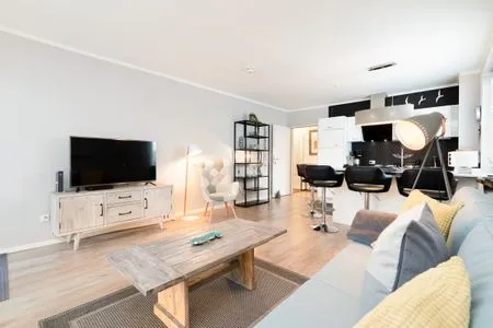 Wohnzimmer Ferienwohnung "StrandPause 52"