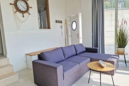 Wohnzimmer Villa Küstenperle, App. Muschelblick - Meerblick pur!