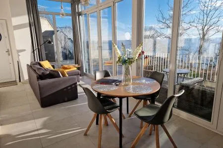 Wohnzimmer Villa Küstenperle, App. Muschelblick - Meerblick pur!