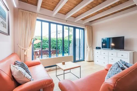 Wohnzimmer Haus Muschelsucher, Dünenstraße 44, App. 2